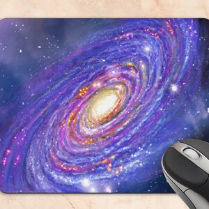 May include: A vibrant purple and blue galaxy with a swirling centre of yellow and orange stars. The galaxy is surrounded by a dark blue background with scattered white stars.