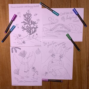 May include: Four black and white coloring pages featuring illustrations of a Christmas tree, a fox, a penguin, and a mouse. The pages have text that reads "Never decorate with hungry ducks!" "Don't bite the tiffy looby Candy Cane!" "Be a good fox, or someone might tell Santa!" and "Tiny little Christmas mouse."