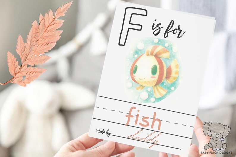 example page letter f with a drawing of a fish signed by daddy