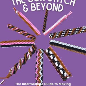 May include: A book cover titled "The Box Stitch & Beyond" with various colorful lanyard samples arranged in a circle. The book is an intermediate guide to making keychains, with the author's name at the bottom. The background is a solid purple.