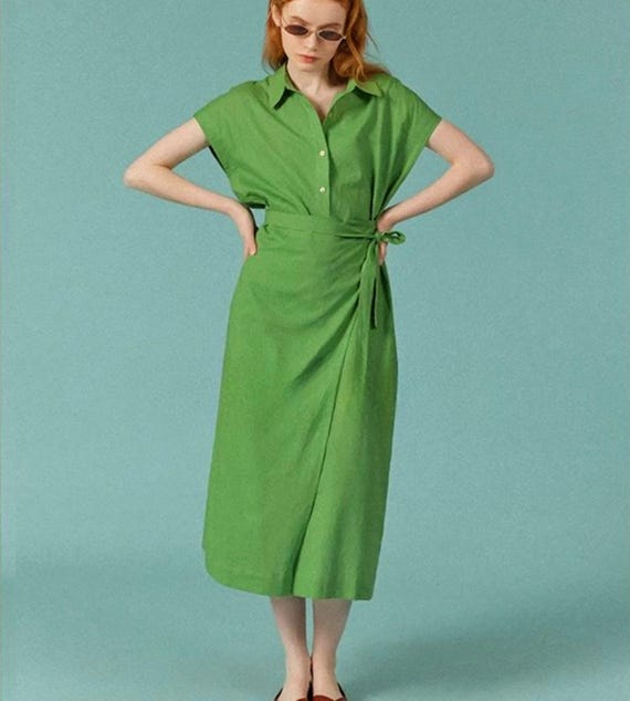 knee length dresses for ladies No Limits Green Smocked Midi Dress – Shop the Mint main image 1