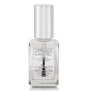 May include: A clear nail polish bottle with a silver cap. The label features the text Karma Hues, Halal Breathable Polish, Vegan Friendly, and Cruelty Free, along with a tree graphic and Arabic script. The bottle is rectangular with a visible brush.