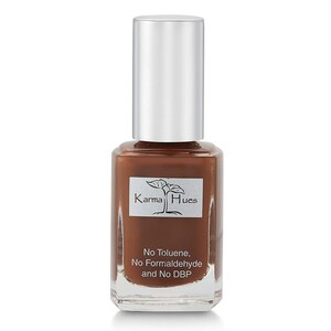 May include: A brown nail polish bottle with a silver cap. The bottle has a label that says "Karma Hues" and "No Toluene, No Formaldehyde and No DBP".