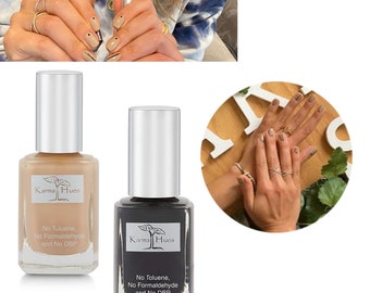 May include: Two bottles of Karma Hues nail polish. The bottle on the left is a light beige color and the bottle on the right is black. Both bottles have the same label with the text "Karma Hues" and "No Toluene, No Formaldehyde and No DBP".