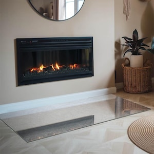 Estensione per focolare rettangolare con texture in cemento grezzo, decorazione per camino grigio, piastra per focolare in vetro, piastra per pavimento per camino minimalista