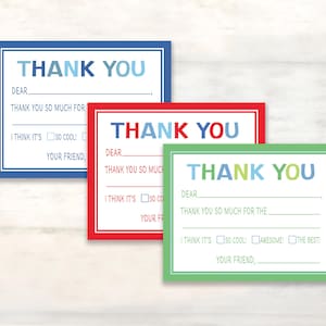 May include: Three rectangular thank you note cards with blue, red, and green borders. Each card features the text THANK YOU, a line for a name, a line for a gift description, and checkboxes with labels like SO COOL, AWESOME, and THE BEST.