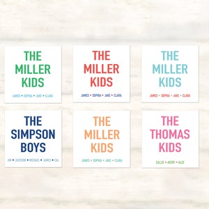 May include: Six white square cards with colorful text. The cards read "The Miller Kids", "The Simpson Boys", "The Thomas Kids", and "The Miller Kids". Each card lists the names of the children.