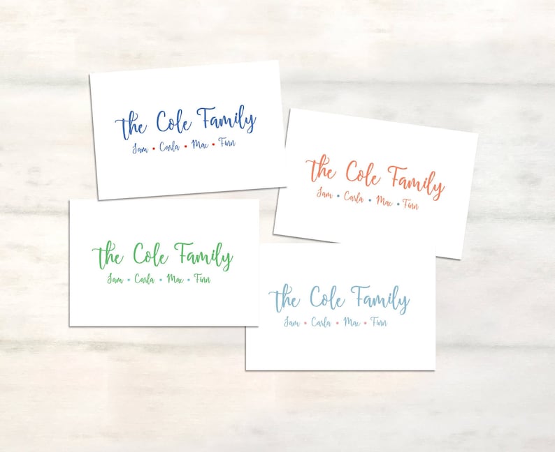 May include: Four white cards with the text "The Cole Family" in different colors. The names "Sam, Carla, Max, and Tim" are listed below the family name on each card.