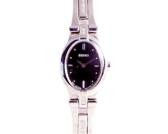 Seiko Diamond Watch, Silver Tone Stainless Steel, Easy Read Black Dial