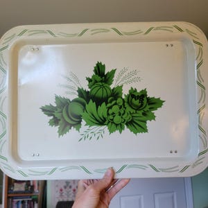 Vintage metal rectangular folding serving tray with legs - white with green leaves, fruit, and wheat design