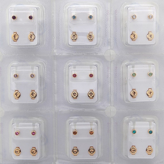 thumbnail image 2 of 12 Pairs Studex Birthstone Stud Earrings - 2mm Stainless Steel Bezel Setting, 16 Gauge Posts, Sterilized 2 of 14