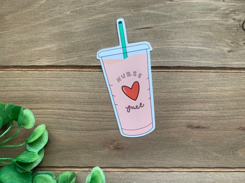 May include: A pink and white sticker of a coffee cup with a green straw. The cup has the text "Nurse Fuel" and a red heart.
