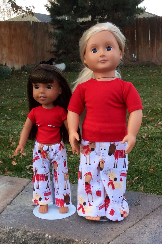 girl and doll matching christmas pajamas