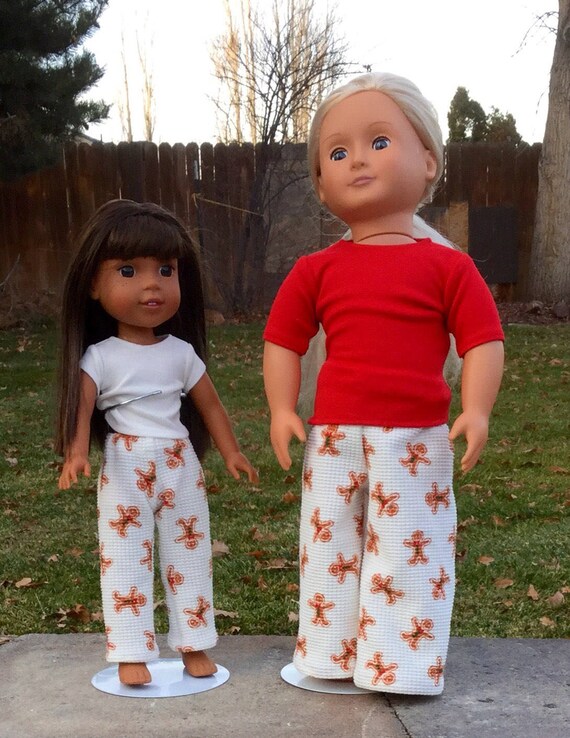 girl and doll matching christmas pajamas