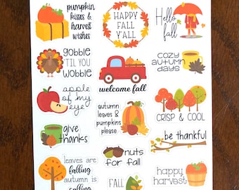 May include: A set of 16 fall-themed stickers with various autumnal designs and sayings. The stickers feature pumpkins, leaves, trees, and other fall imagery. Some of the sayings include "Happy Fall Y'all", "Gobble 'Til You Wobble", "Fall Breeze Autumn Leaves", and "Pumpkin Spice & Everything Nice".