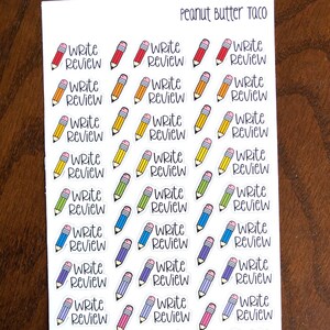 May include: A sheet of colorful pencil stickers with the text "Write Review" on each sticker. The stickers are arranged in rows of three.