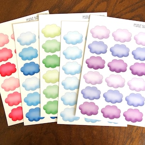 May include: Four sheets of cloud-shaped stickers in pink, blue, green, and purple. Each sheet has 12 stickers with the text "Peanut Butter" at the top.