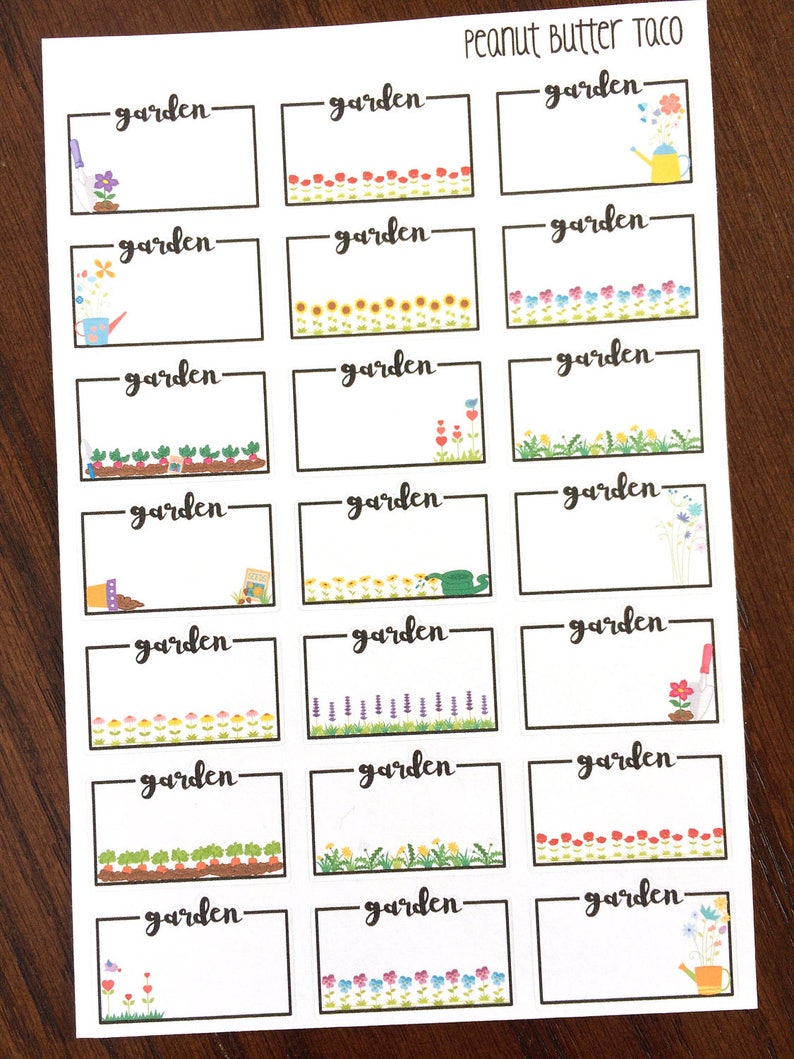 May include: A sheet of 18 blank garden labels with colourful flower and plant illustrations. Each label has the word "garden" written on it.