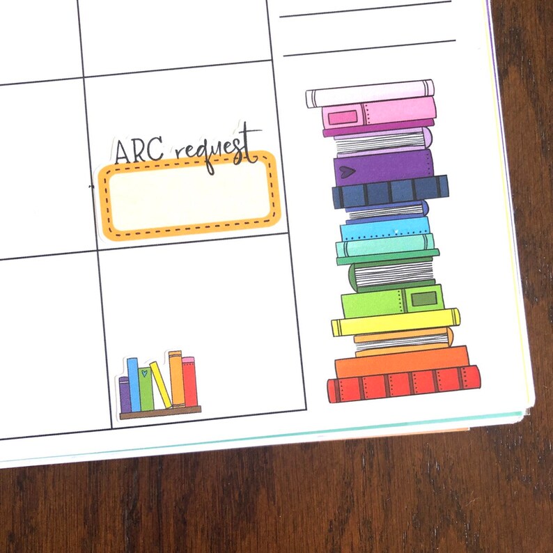 May include: A planner page with a sticker that says "ARC request" and a blank space for writing. There is also a sticker of a stack of books and a sticker of a bookshelf with books.