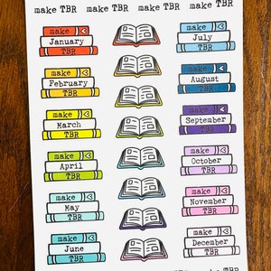 May include: A set of 12 colorful book stack stickers with the text "make TBR" and the months of the year. The stickers are perfect for organizing your to-be-read list.