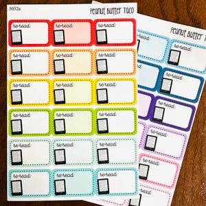 May include: A sheet of colorful stickers with a black and white illustration of an e-reader on each sticker. The stickers are labeled "re-read:" and are arranged in rows. The text "Peanut Butter Taco" is printed at the top of the sheet.