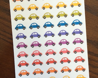 May include: A sheet of colorful car stickers with the text "Peanut Butter Taco" at the top. The stickers are arranged in rows of seven, with each row featuring a different color: red, orange, yellow, green, blue, purple, and pink.