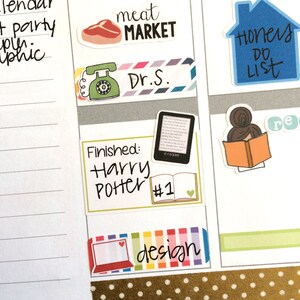 May include: A planner page with colorful stickers. The stickers include a meat market, a phone, a book, a house with the words "Honey Do List", and a laptop with the word "design".