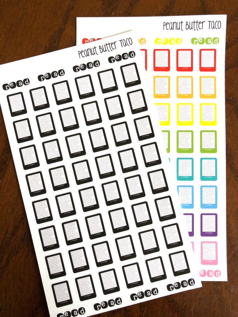 May include: Two sheets of stickers with a black and white e-reader design. The stickers are labeled "Peanut Butter Taco" and have the word "read" printed on them.