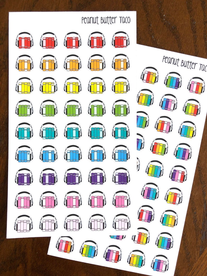 May include: Two sheets of stickers with a rainbow of colors. Each sticker features a stack of books with headphones on top. The text "Peanut Butter Taco" is at the top of each sheet.