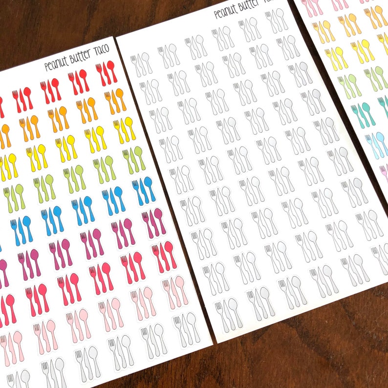 May include: A set of three sheets of stickers featuring a variety of colorful cutlery designs. The stickers are labeled "Peanut Butter Taco" and "Peanut Butter".