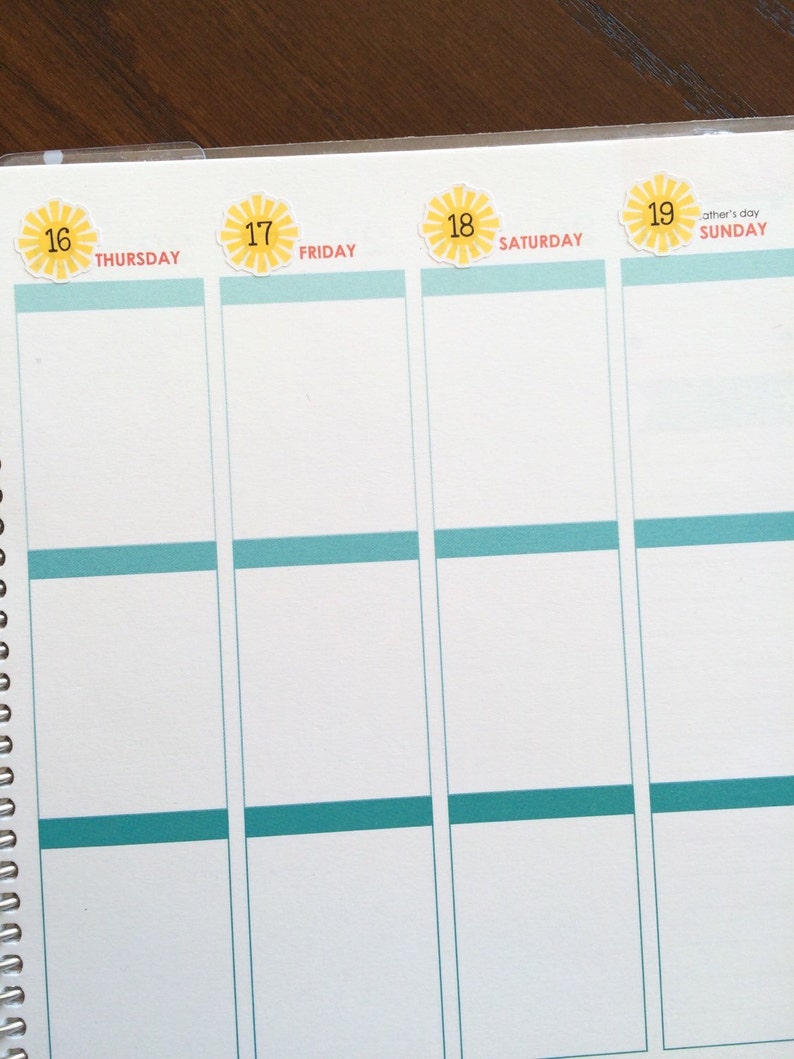 May include: A planner page with a spiral binding, featuring four days of the week. Each day has a teal border and a yellow sun sticker with a number. The days are Thursday, Friday, Saturday, and Sunday, with the 19th labeled as Father's Day.