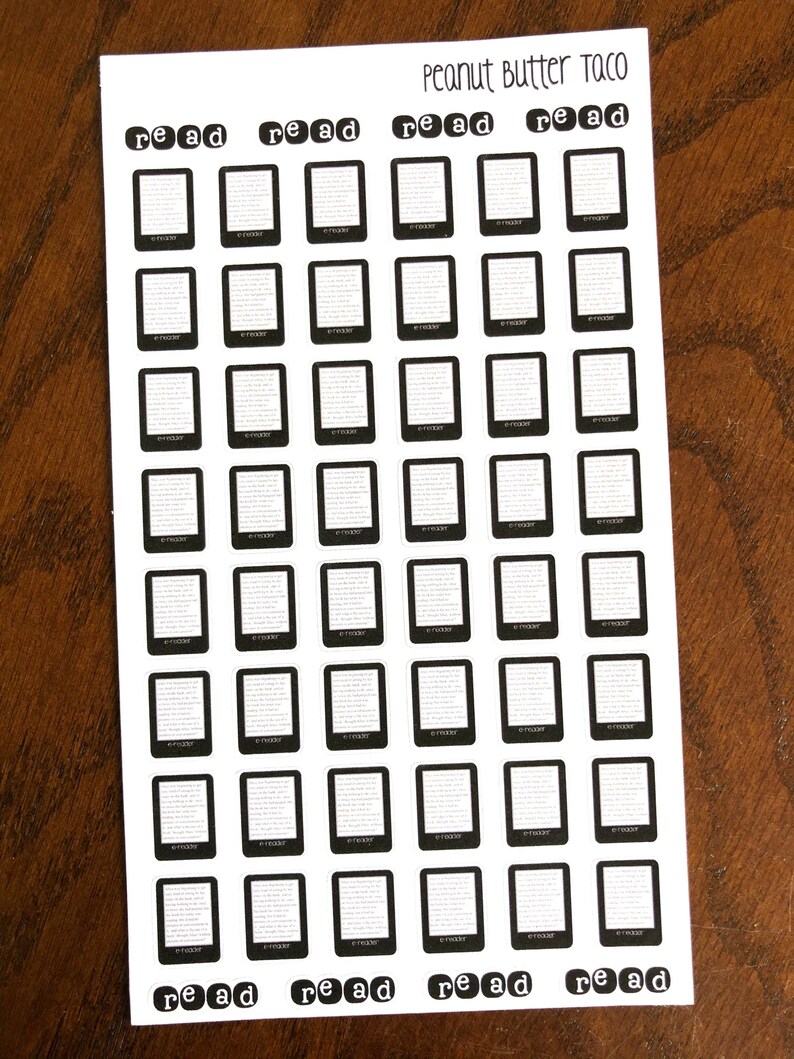 May include: A sheet of black and white planner stickers with the word "read" printed on each sticker. The stickers are in the shape of a book and are arranged in a grid pattern. The sheet is labeled "Peanut Butter Taco".