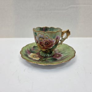 Rare Chubu China very ornate fancy floral and gold Demitasse Tea cup and saucer