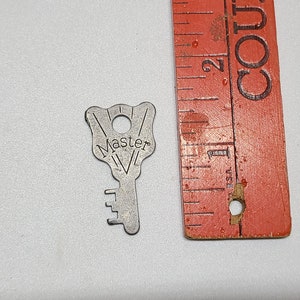 Zeldzame ongebruikelijke antieke Master lock platte sleutel 1 1/2"