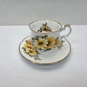 Royal Minster Yellow flower Tea cup and saucer