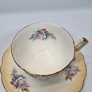 Antique Aynsley fancy floral Tea cup and saucer pink white roses