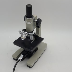 Bausch & Lomb microscope w/ slide holder and 3 objectives electric light