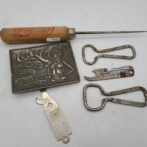 Lot of 6 Soda Advertising collectibles, Coca cola ice pick, opener and belt buckle Ato mar, puroxia openers