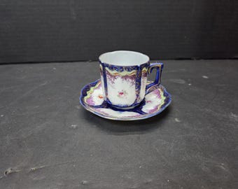 Antique cobalt blue and gold with hand painted flowers Demitasse tea cup and saucer