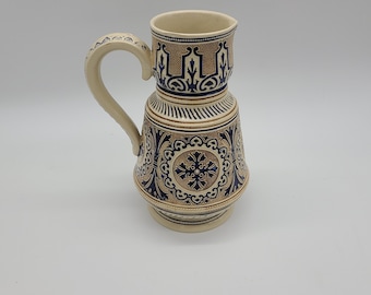 Antique salt glaze style cobalt blue and brown Very ornate pitcher 9" tall