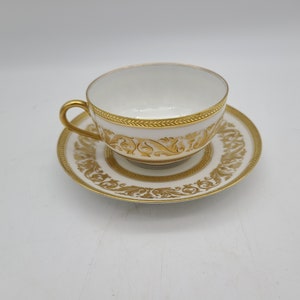 CA france Richard Briggs gold encrusted Tea cup and saucer very fancy