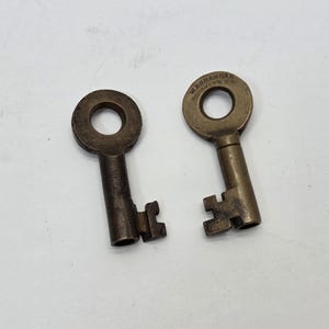 Lot of 2 W. bohannan railroad type brass barrel keys