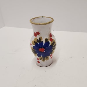 Small hand made pottery vase hand painted