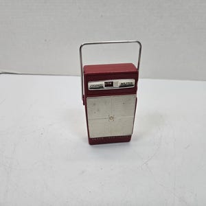 Channel Master maroon Red 6516 portable transistor radio