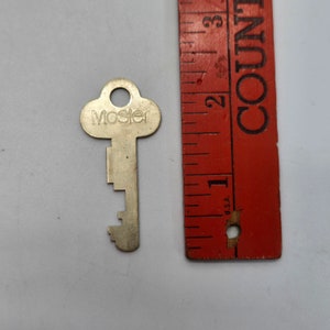 Antique Weird unusual Cut flat Key Graham Mfg Co.