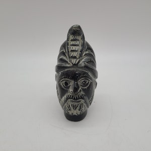 Hand carved soapstone ancient of a ancient figure head