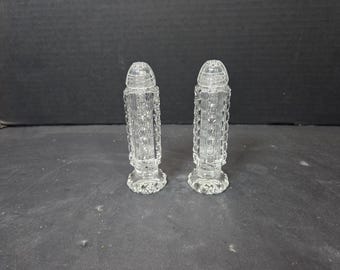 Pair of antique Cut crystal salt and pepper shakers 5" glass tops