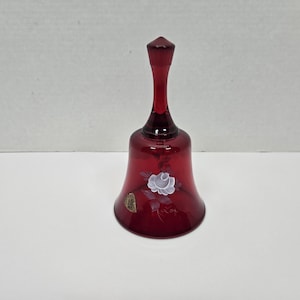 Fenton Ruby red bell w/ hand painted white flower hand signed S. Walsh