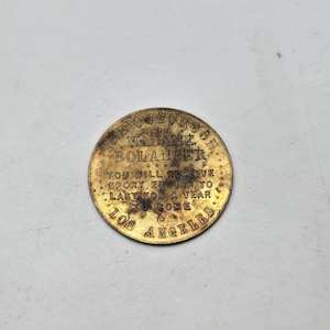 The Octoroom Token Madame Bolanger Los Angeles brothel token brass coin