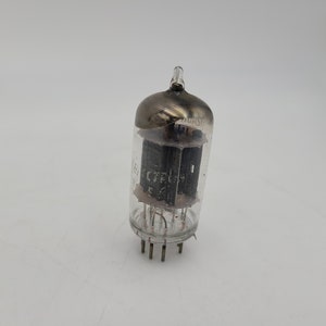 RCA Early white print black plate 12AU7 tube square getter Tests great
